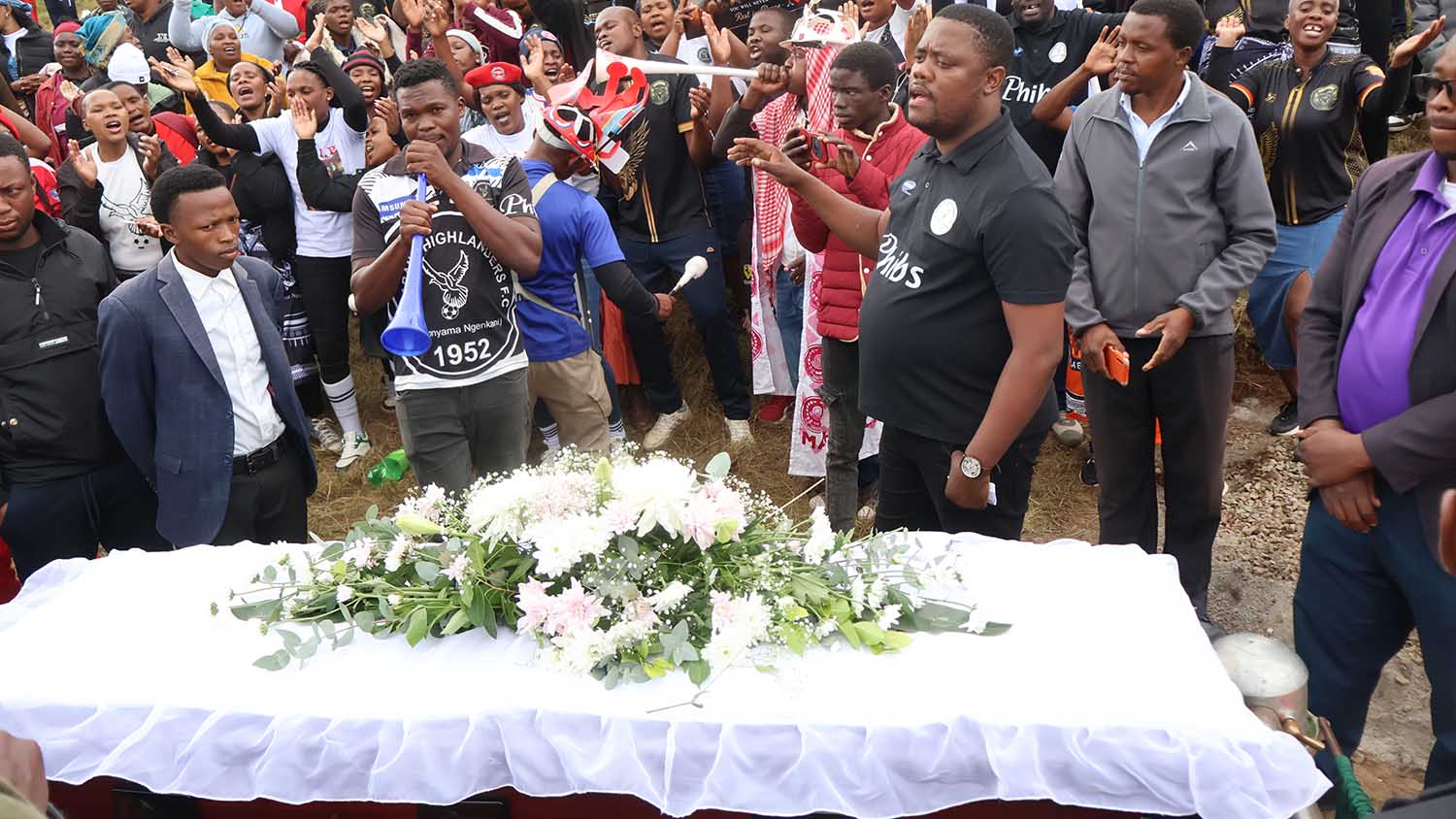 Scores of football fans gathered to pay their final respects to Mbabane Highlanders 